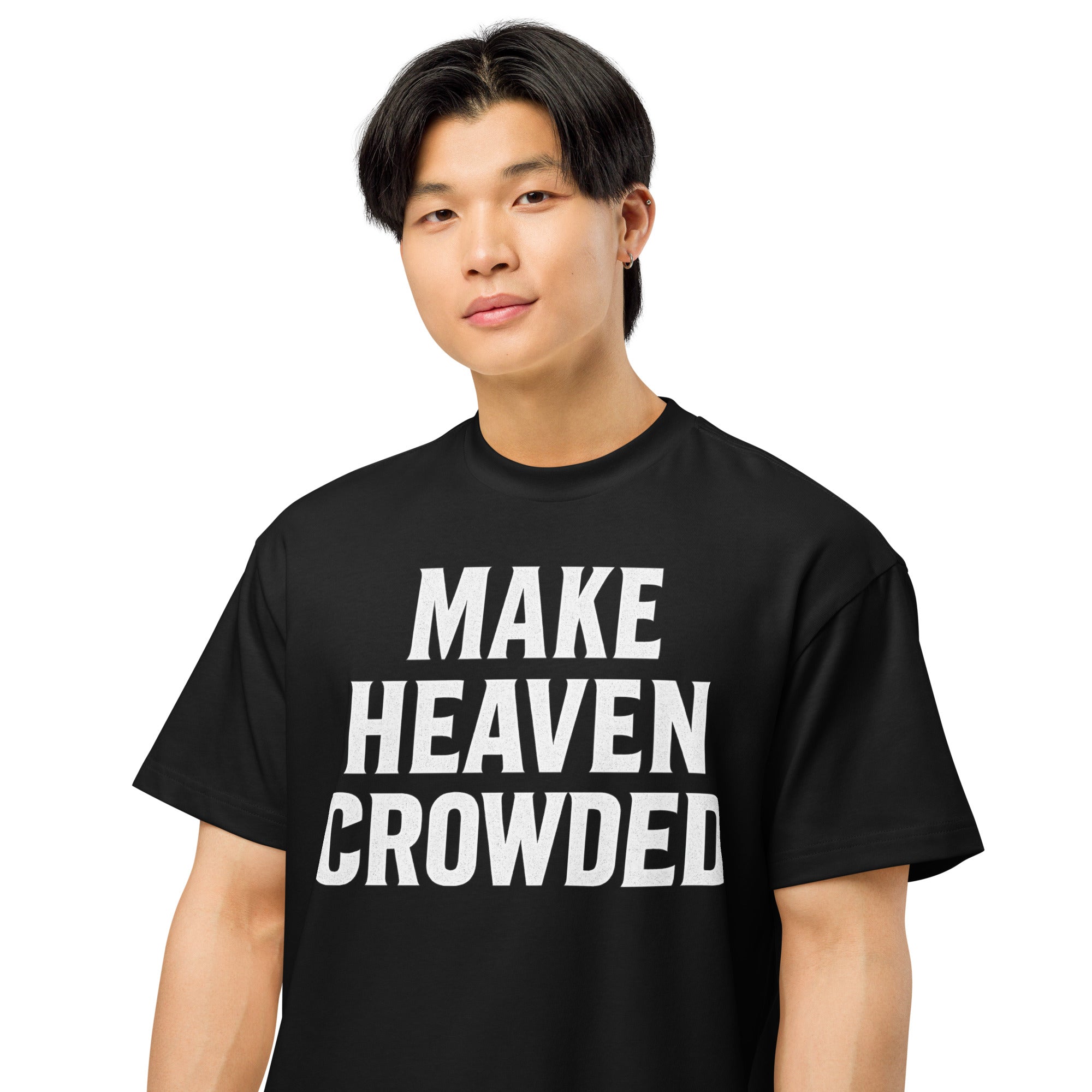 Person wearing a black t-shirt with 'MAKE HEAVEN CROWDED' text on a white background