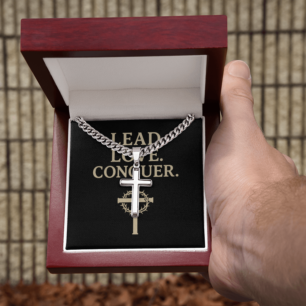 Silver Cuban link chain with engraved cross presented in a gift box

