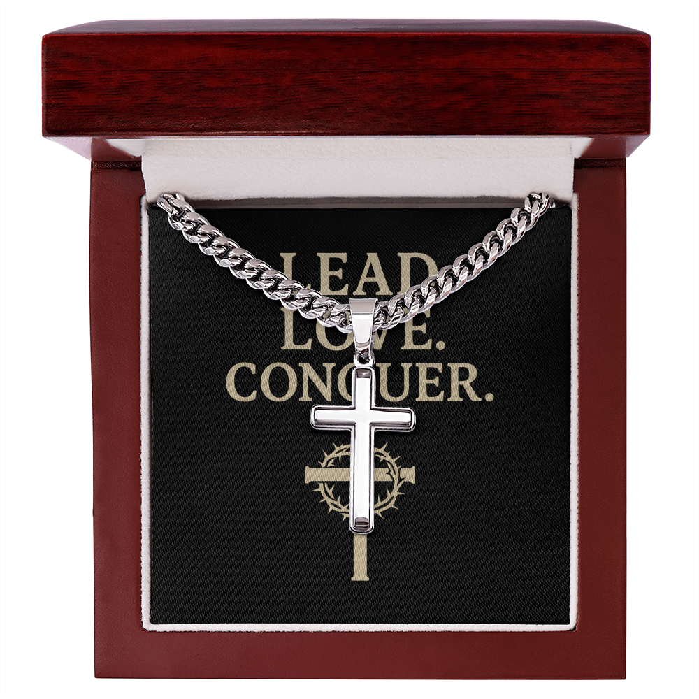 Silver Cuban link chain with engraved cross presented in a gift box

