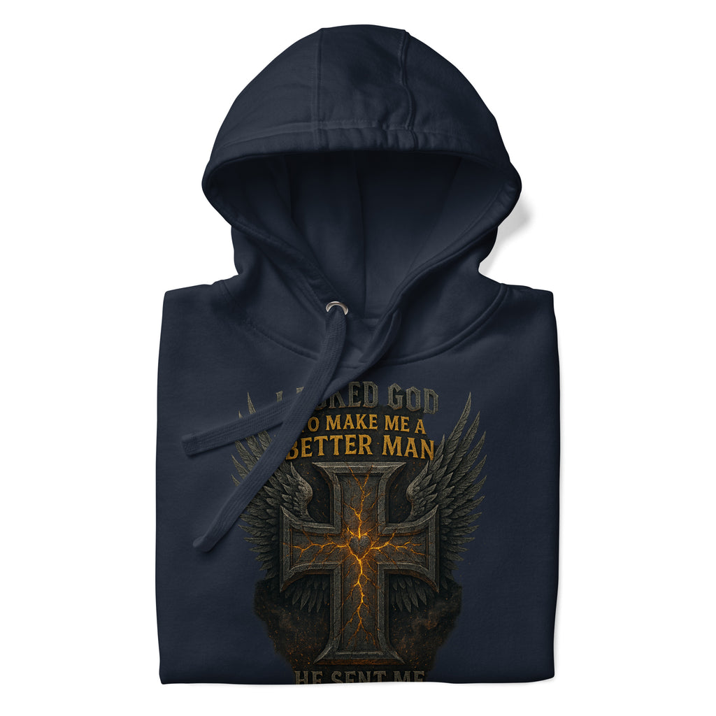 Navy Christian hoodie with cross and wings design that reads “I asked God to make me a better man, He sent me my wife.”
