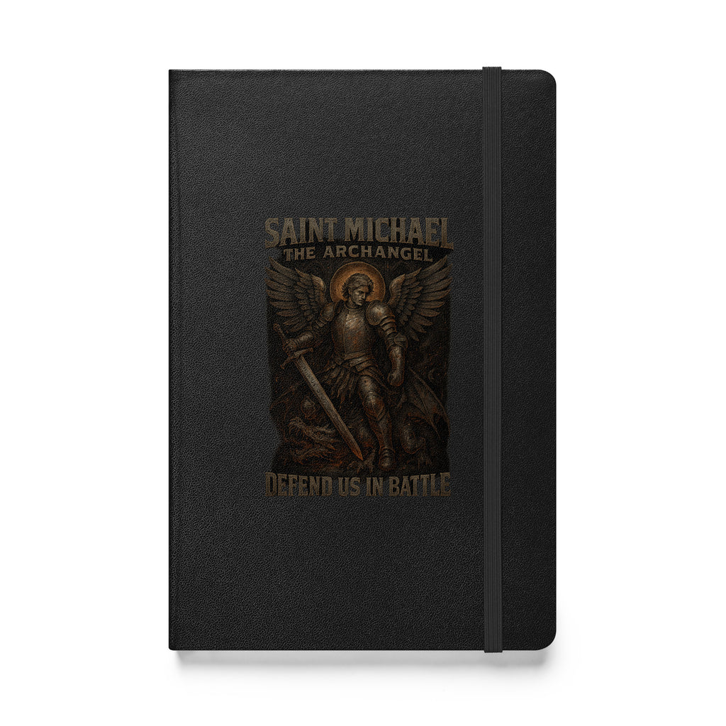 Hardcover prayer journal with Saint Michael the Archangel in armor holding a sword and the words “Defend Us in Battle” on a black cover.