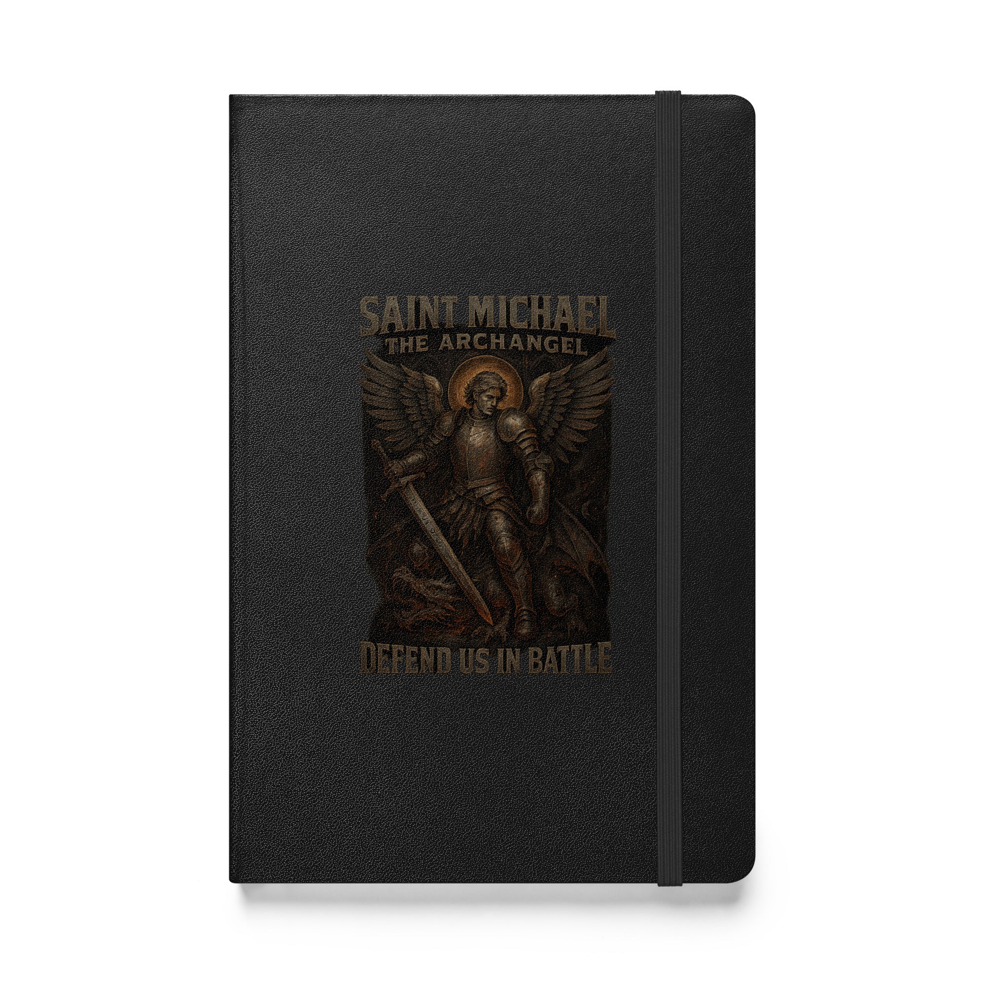 Hardcover prayer journal with Saint Michael the Archangel in armor holding a sword and the words “Defend Us in Battle” on a black cover.