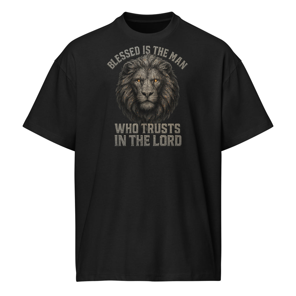 Black men’s box tee with Lion of Judah graphic and text “Blessed Is the Man Who Trusts in the Lord” from Jeremiah 17:7.
