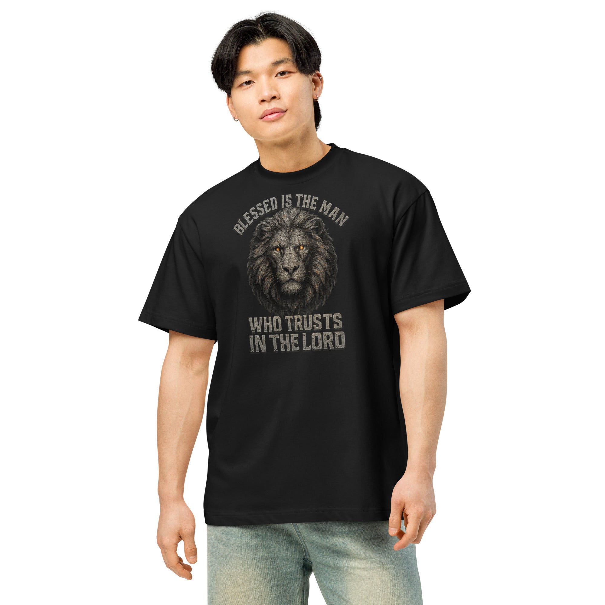 Black men’s box tee with Lion of Judah graphic and text “Blessed Is the Man Who Trusts in the Lord” from Jeremiah 17:7.