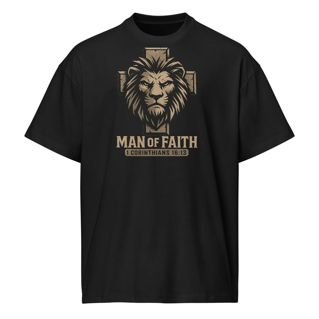 Black Cotton Heritage Men’s Box Tee with lion and cross graphic and text ‘Man of Faith – 1 Corinthians 16:13’ in bold Christian design.