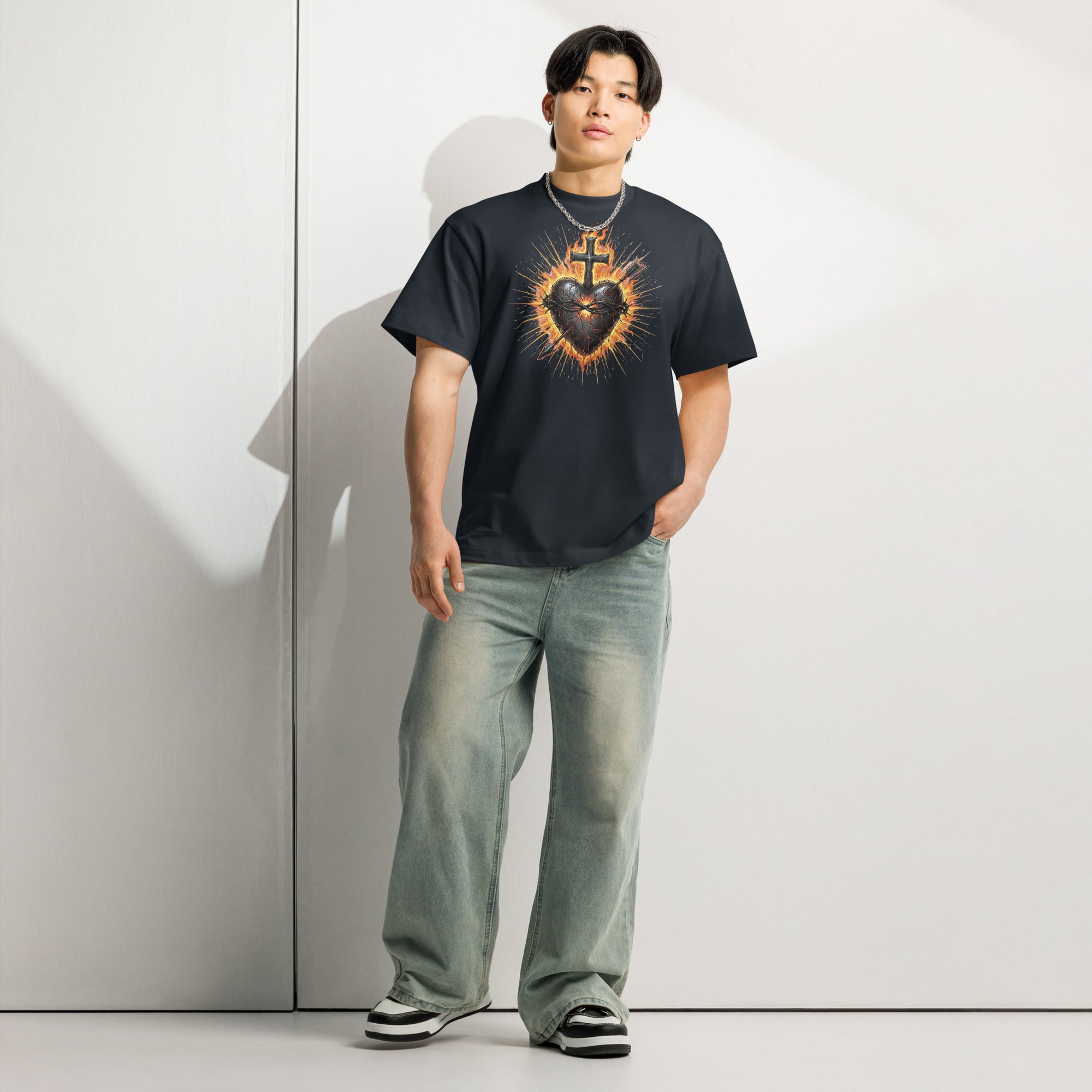 Navy men’s box tee with a fiery Sacred Heart of Jesus graphic and cross, designed on Cotton Heritage MC1087.