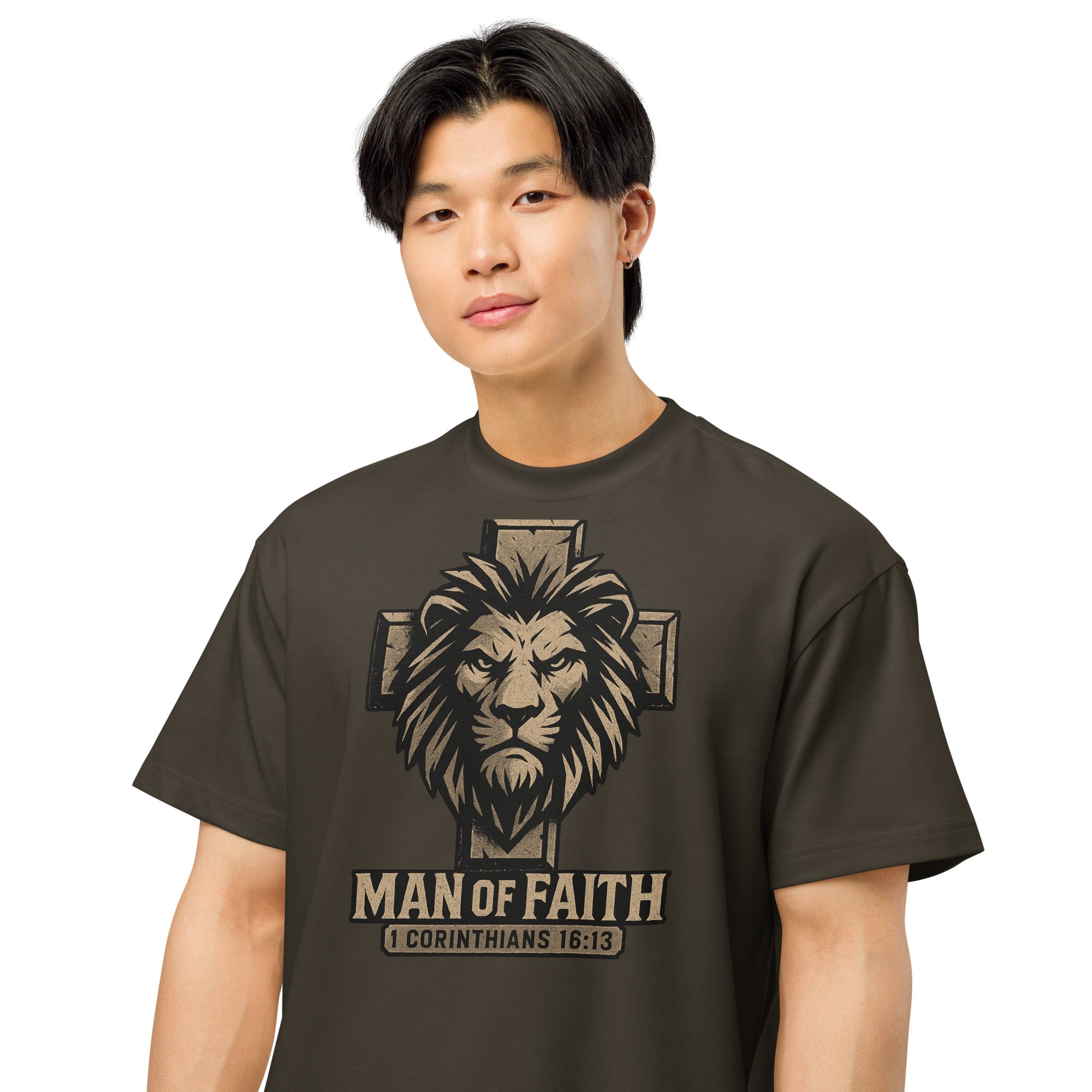 Vintage Black Cotton Heritage Men’s Box Tee with lion and cross graphic and text ‘Man of Faith – 1 Corinthians 16:13’ in bold Christian design.
