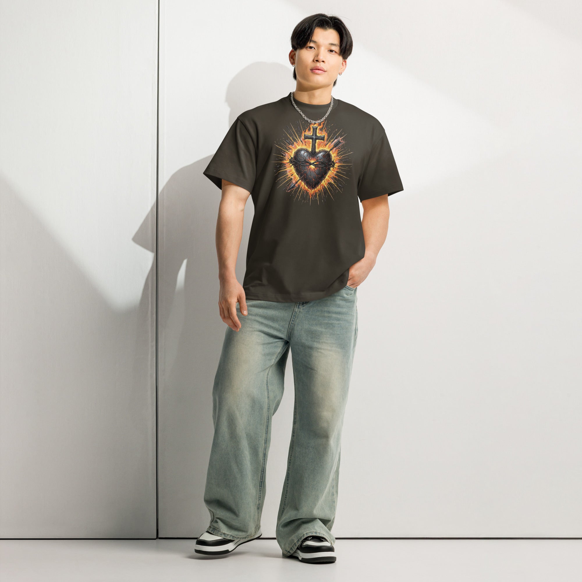Black men’s box tee with a fiery Sacred Heart of Jesus graphic and cross, designed on Cotton Heritage MC1087.