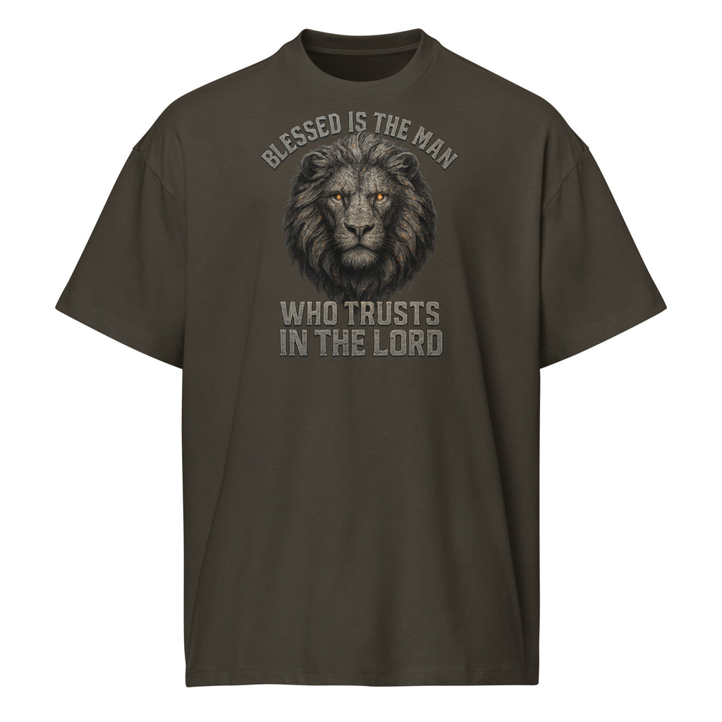 Black men’s box tee with Lion of Judah graphic and text “Blessed Is the Man Who Trusts in the Lord” from Jeremiah 17:7.
