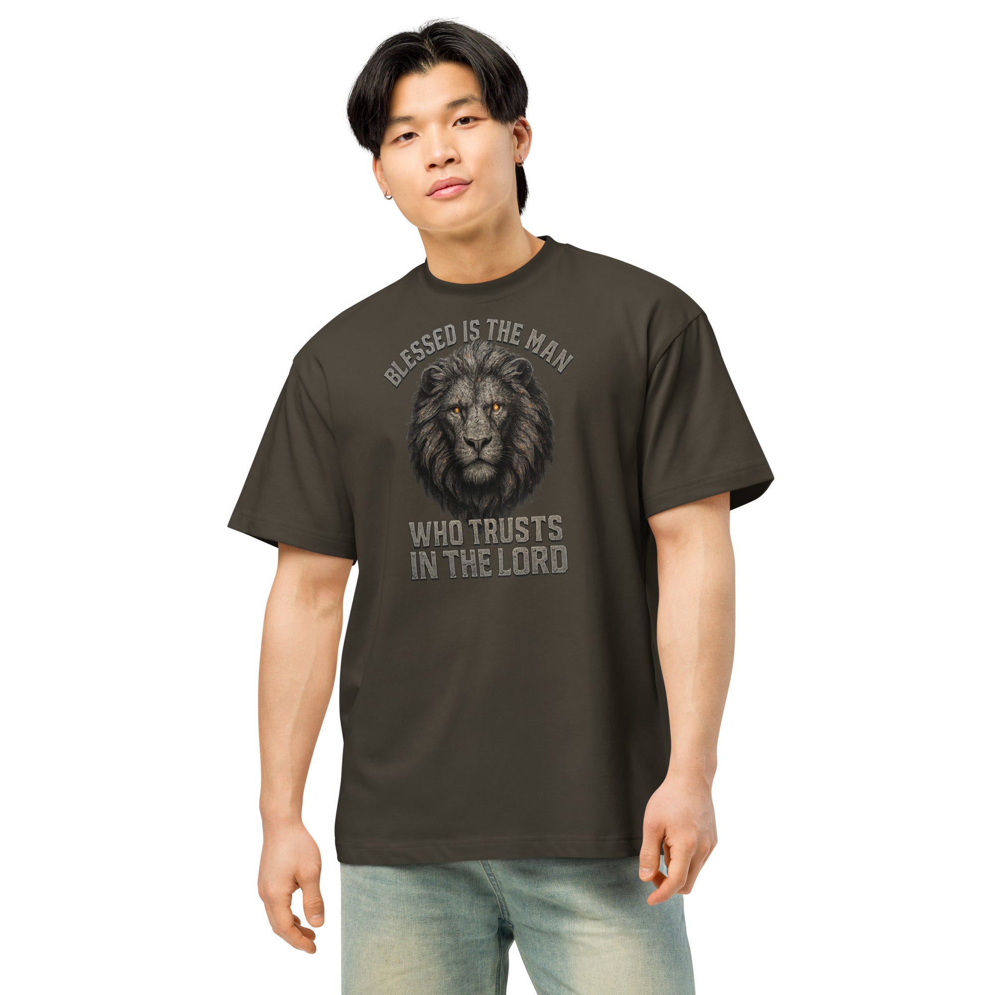 Black men’s box tee with Lion of Judah graphic and text “Blessed Is the Man Who Trusts in the Lord” from Jeremiah 17:7.