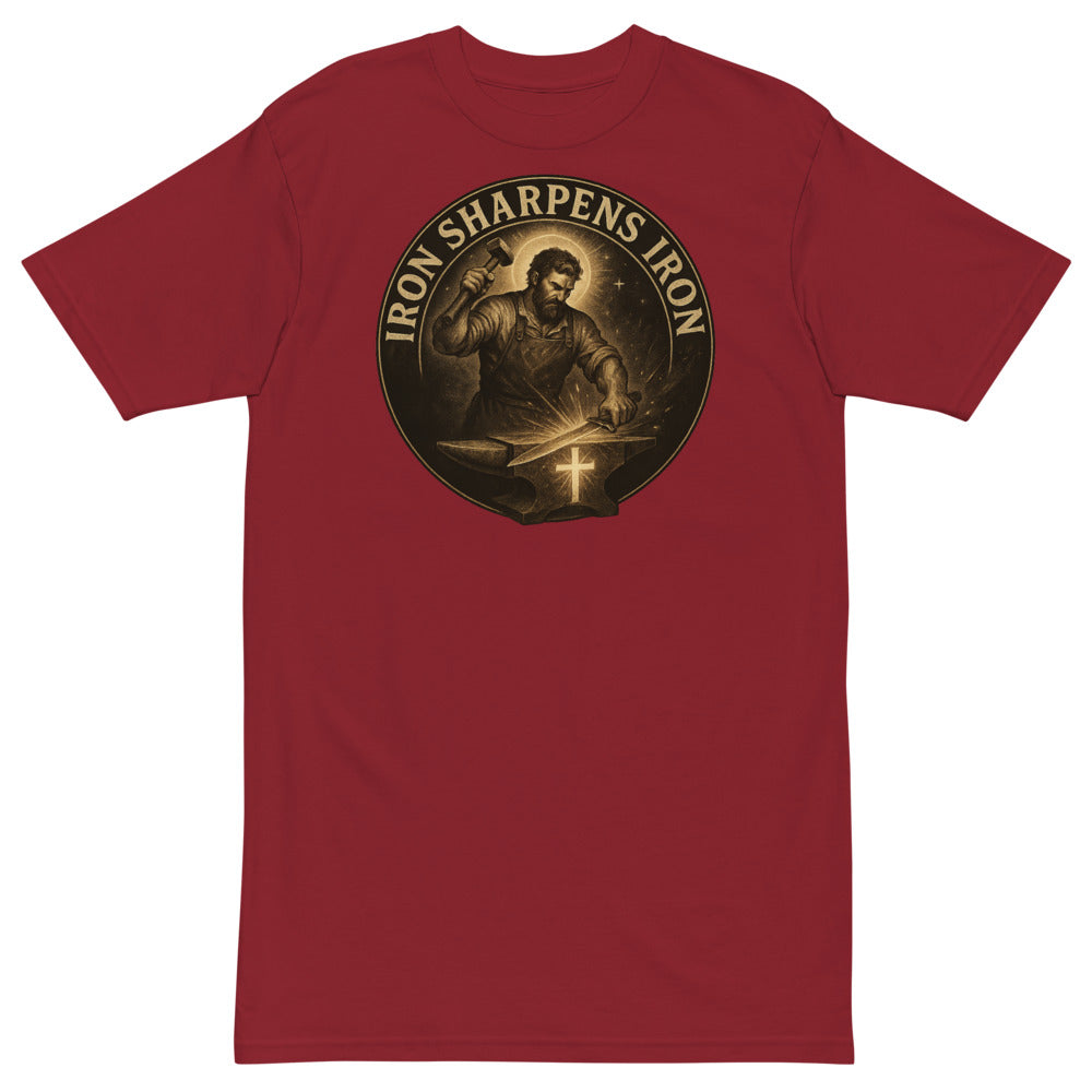 Red t-shirt with a graphic design of a man holding a sword and cross, with 'Iron Sharpens Iron' text on a white background.