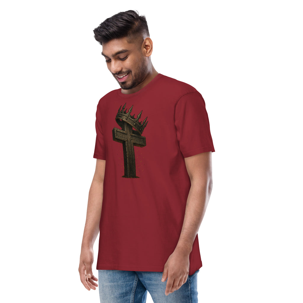 Red Catholic men’s t-shirt featuring a bold wooden cross crowned with thorns and a metal crown, symbolizing Christ’s victory and sacrifice.