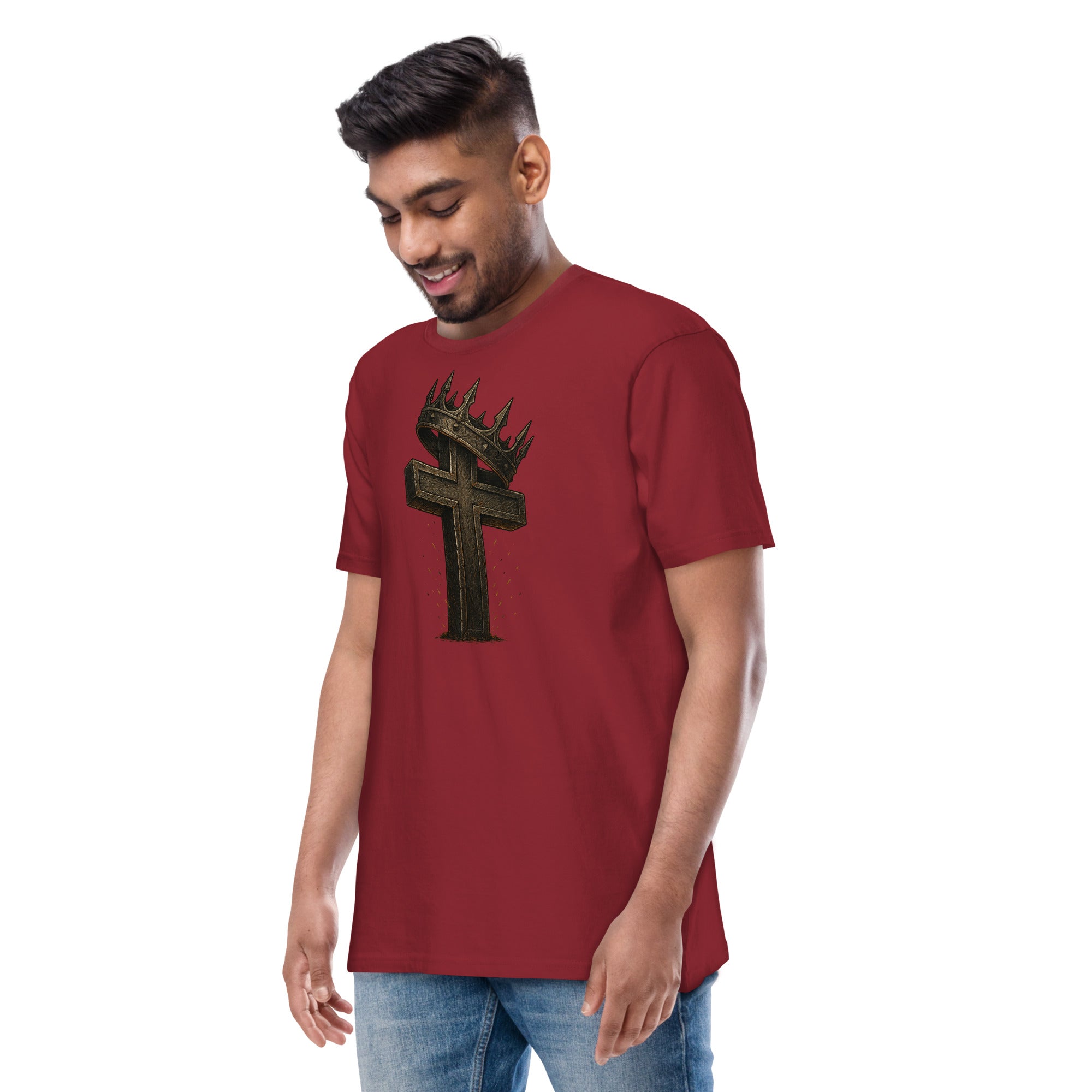 Red Catholic men’s t-shirt featuring a bold wooden cross crowned with thorns and a metal crown, symbolizing Christ’s victory and sacrifice.