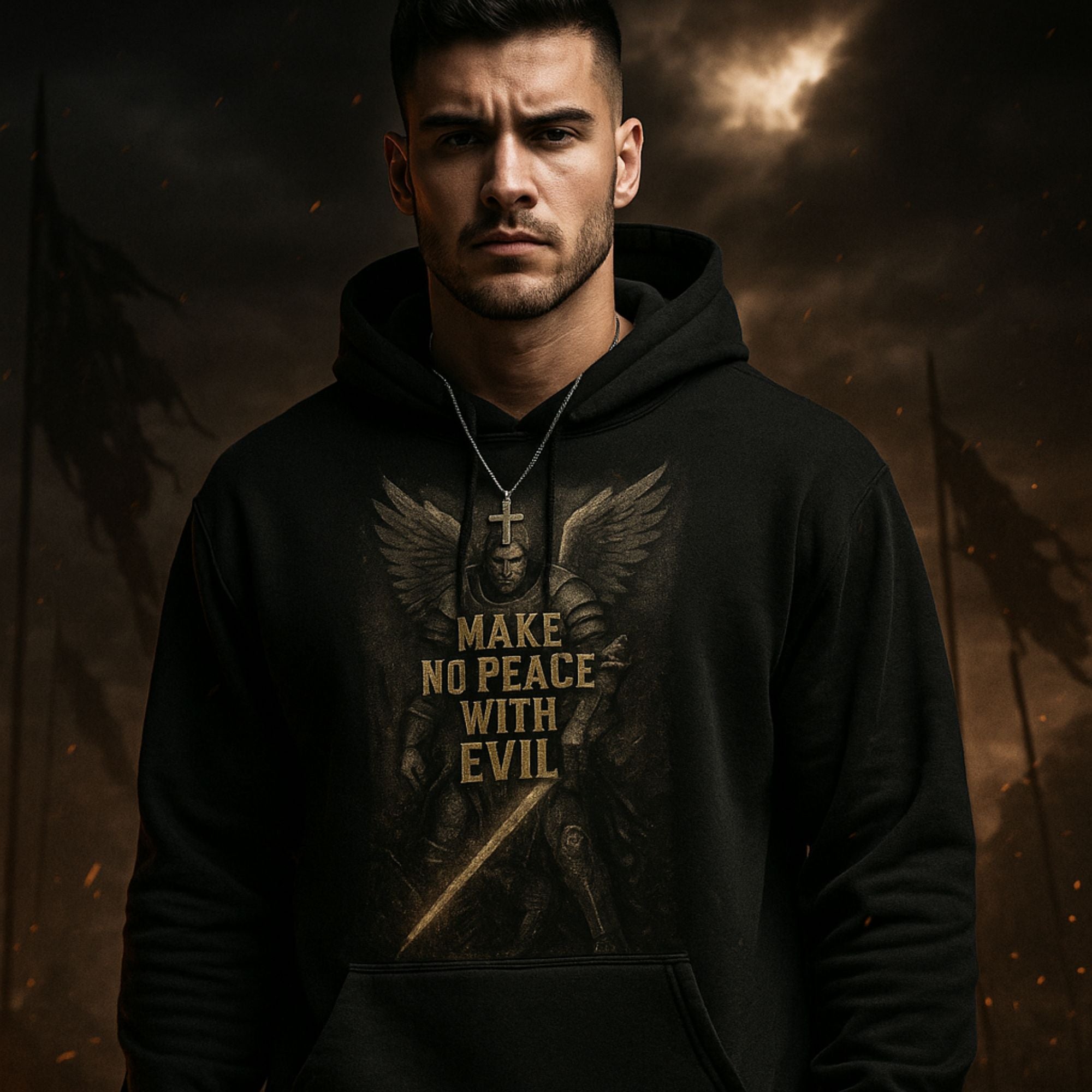 Man wearing a black hoodie with a motivational quote against a dark background