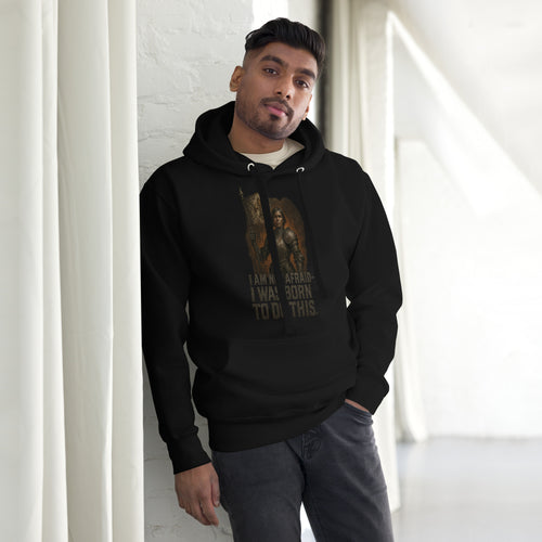 Black Cotton Heritage premium hoodie featuring Joan of Arc warrior graphic with fleur-de-lis banner and the quote “I Am Not Afraid – I Was Born to Do This.”